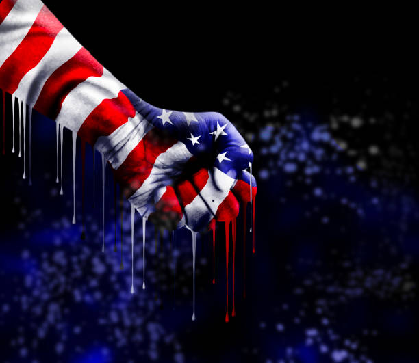 istock American flag dripping paint from clenched fist 2168358505