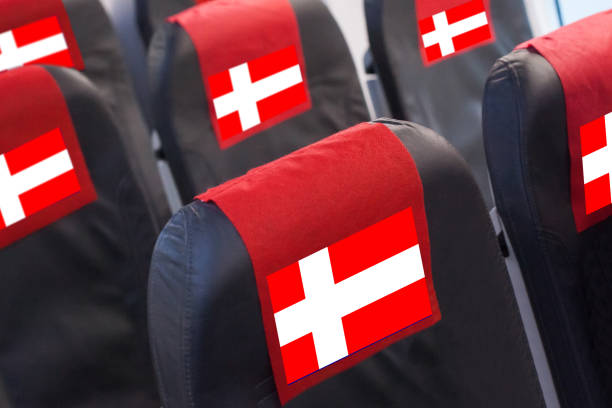 Danish Flag on Empty seat in plane. Travel, flight and transportration in Denmark concept