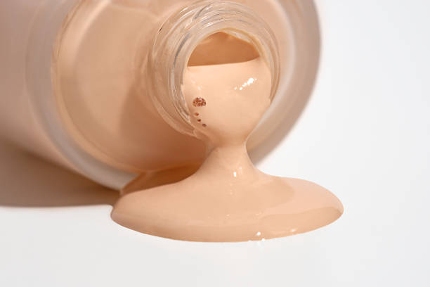 istock liquid foundation spilled out of bottle isolated 2168364210