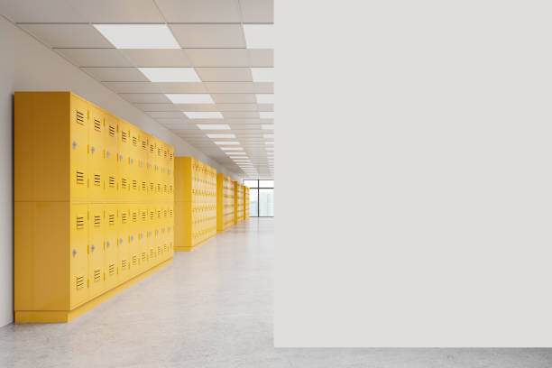 istock School hallway with yellow lockers in row, back to school concept. Mockup wall 2168366987