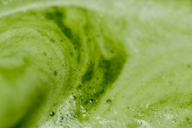istock A macro close-up image of green tea with a smooth, frothy texture. 2168372515