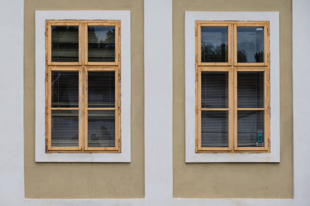 istock vintage windows with frames on pastel color wall 2168375266