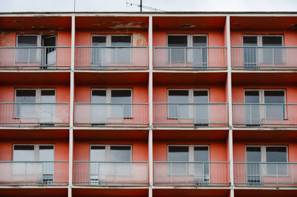 istock rows of red balconies on apartment building 2168375294