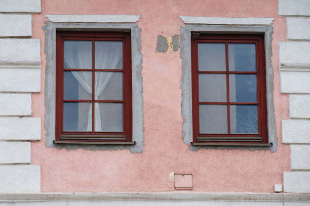 istock vintage windows with frames on pastel color wall 2168375379