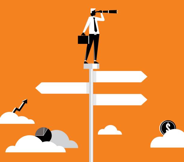 istock Businessman with spyglass on a crossroad sign 2168375577