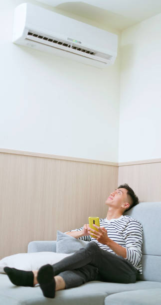 istock Asian male smart hone applicance 2168377149