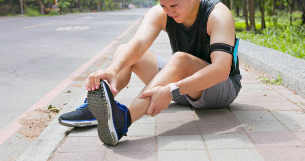 istock asian man sporting ankle injury 2168377277