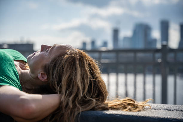 istock A woman taking a break during a bike ride. 2168378164