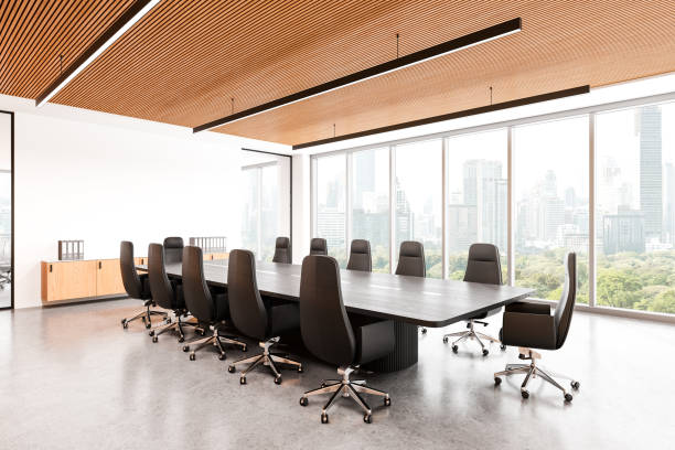 istock Modern office interior with board and chairs, drawer and panoramic window 2168379677