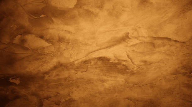 istock A rough cement texture background with a dark brown gradient in the middle. For backdrop, old, grunge, banner, scene 2168383894