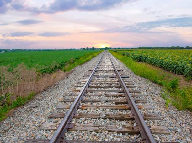 istock Railroad Tracks through crop fields, at surnrise-Miami County, Indiana 2168385942