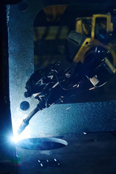 istock Robotic Arm Welding Metal in Industrial Setting 2168386308