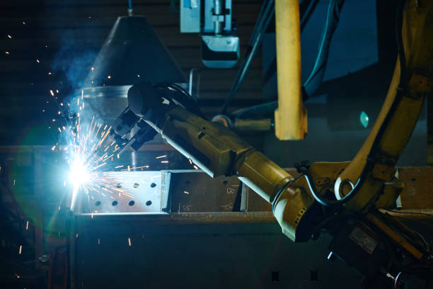 istock Automated Welding Robot Operating in Industrial Setting 2168386318