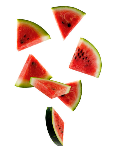 istock Pieces of watermelon form an abstract figure in space. Isolated on white. 2168388080