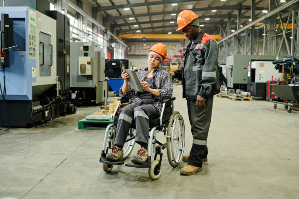 istock Collaborating in Modern Industrial Manufacturing Space 2168390001