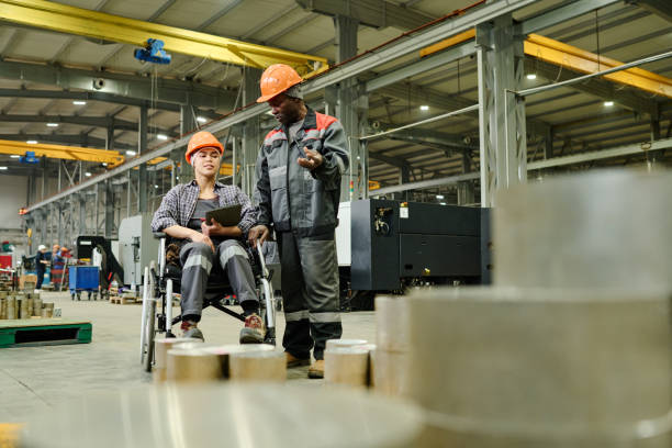 istock Discussing Production Details in Industrial Setting 2168390004