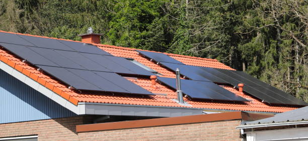 istock a house roof with a new solar system 2168398071