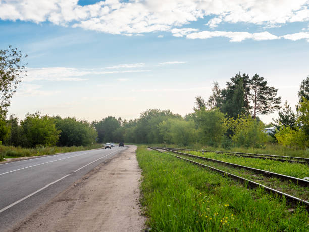 istock highway and railway tracks and rails along road 2168398537