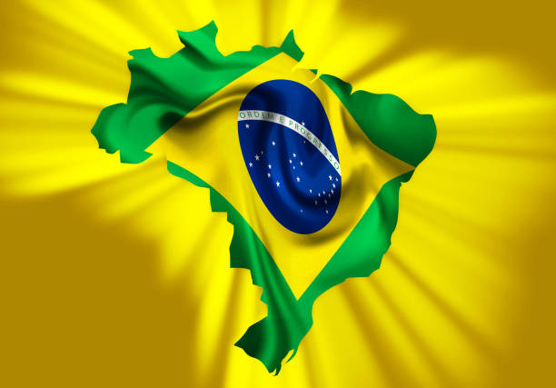 istock Brazilian flag waving over map of brazil background 2168398674