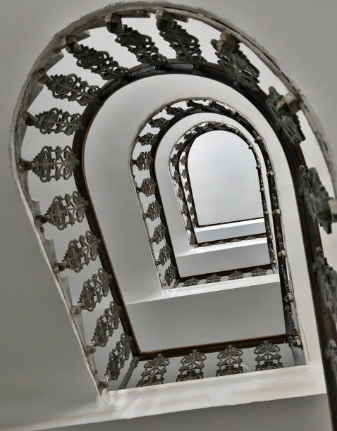istock Spiral staircase in a residential house 2168400268