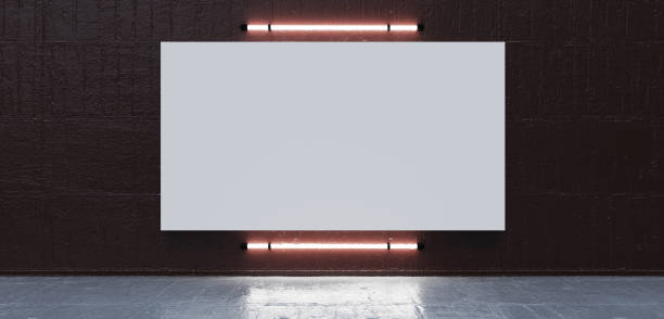 istock Inside a concrete exhibition hall with modern lighting and blank mock up banners. 3D rendering. Dark room lit with neon lights. Reflections on floor and walls. Empty frames. Picture frames. Neon lights. 2168404665
