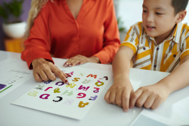 istock Learning Alphabet Letters with Adult Guidance 2168404898