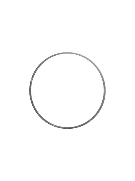 istock Round rusty cast iron frame is isolated. The metal is heavily weathered and pitted. 2168405383