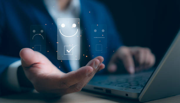 istock Customer service and Satisfaction concept, Businessman touching the virtual screen on the happy Smiley face icon to give satisfaction in service. rating very impressed. 2168405541