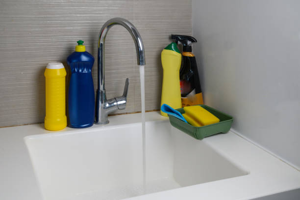 istock Detergents and sponges with napkins. 2168410105