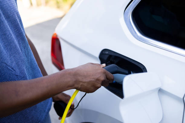istock Man charging batteries of his EV 2168413794