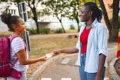 parent-gives-the-child-pocket-money-before-school.jpg?b=1&s=170x170&k=20&c=Dl9ftb5tvONmsTSMa0dwo6eg-Vq4tOgfNeJ4p4SPuDs=