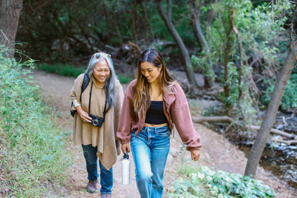 istock exploring the hiking trail together 2168418146