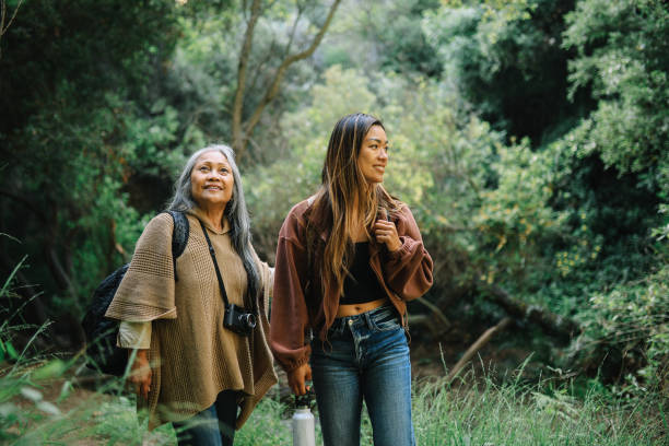 istock exploring the hiking trail together 2168419804