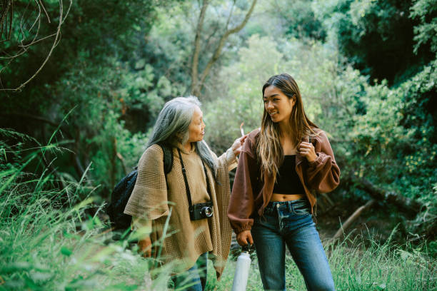 istock exploring the hiking trail together 2168420282