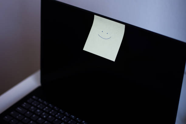 istock Drawing of a happy smiling emoticon on a notebook 2168425034