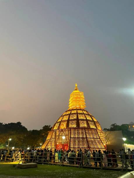 istock Crowds entering puja pandal in the field 2168430403