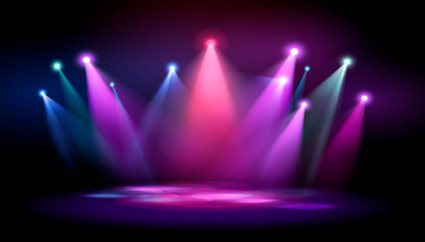 istock Vector spotlights of bright neon colors: red, pink, blue, green, aimed at one point. 2168435775