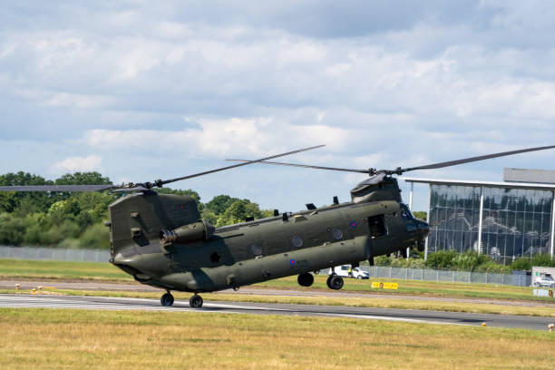 A US Air Force Boeing CH-47 Chinook from the 101st Airborne Division leaving the scene of an air attack demonstration commemorating Operation Market Garden in The Netherlands