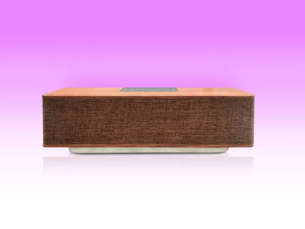 istock front view beautiful brown wooden loudspeaker on pink and white background, technology, object, fashion, decor, copy space 2168445097