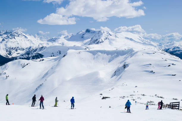 istock Skiing and snowboarding at ski resort 2168450054