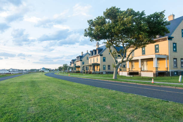 A beautiful sunset is captured surrounding the historic architecture of the buildings at Fort Hancock in Sandy Hook, New Jersey. Photo taken in August of 2024.