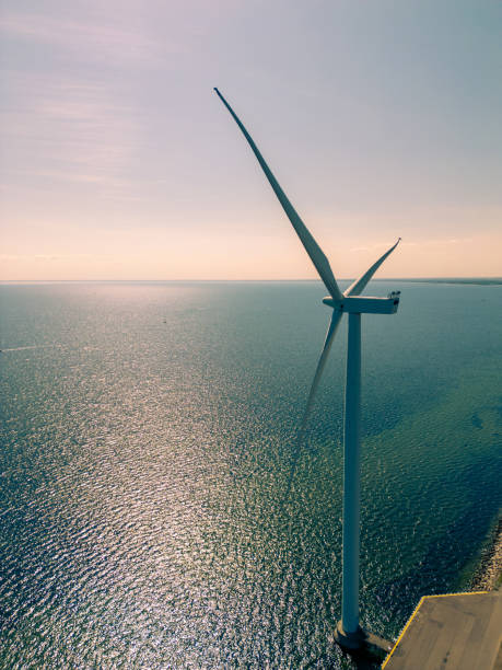 istock Wind turbines at sea 2168460737