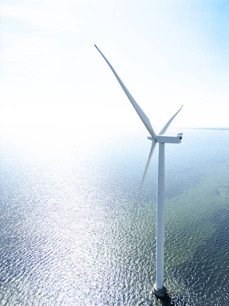 istock Wind turbines at sea 2168460750