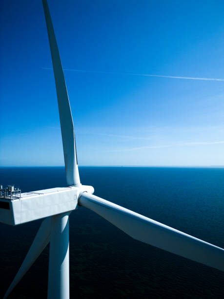 istock Wind turbines at sea 2168460758