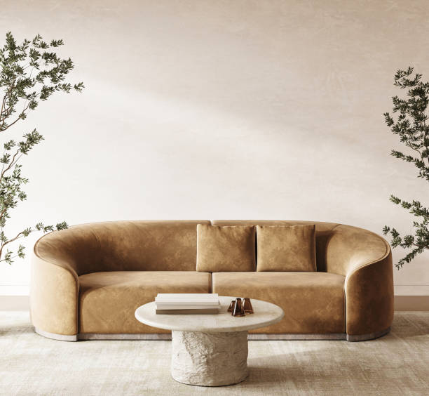 istock Stylish brown sofa along with a minimalist coffee table and beautiful greenery around it, 3d rendering 2168468317