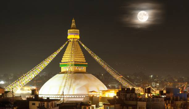 night view of Boudha or Bodhnath stupa with moon