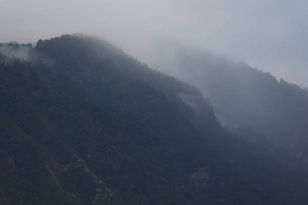 Picture of the clouds rolling over the mountains in Tenerife, Spain after a rain storm.