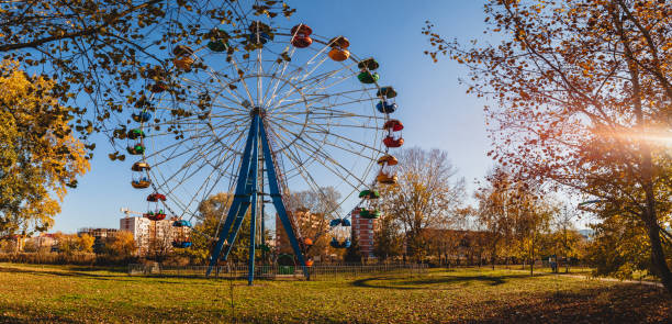 istock A front view of an old multi-colored Ferris wheel in a town park 2168480892