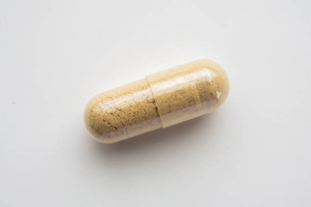 istock Herbal medicine capsule on white background 2168481273