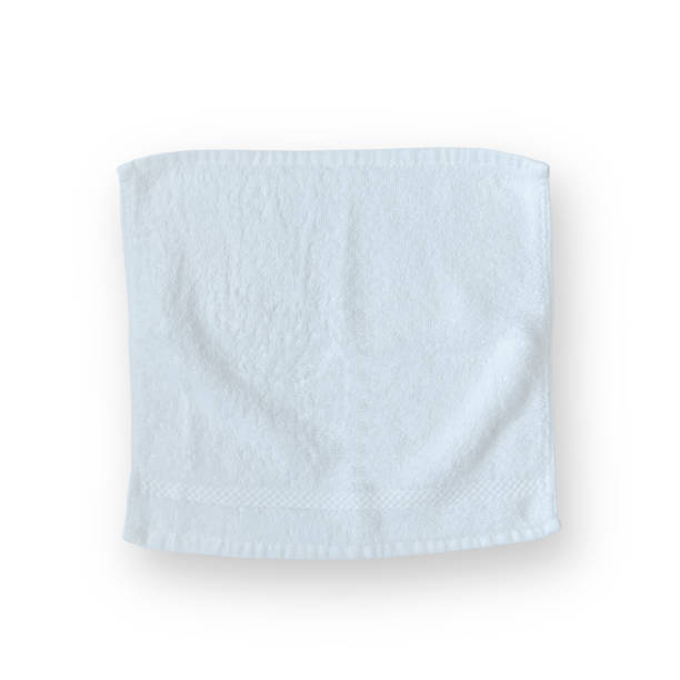 istock White cotton towel mock up square size fabric wiper isolated on white background with clipping path, flat lay top view for hand towel and face cloths mockup template 2168481295